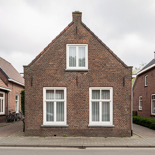 dorpswoning in Goirle met witte kunststof kozijnen aan de voorgevel